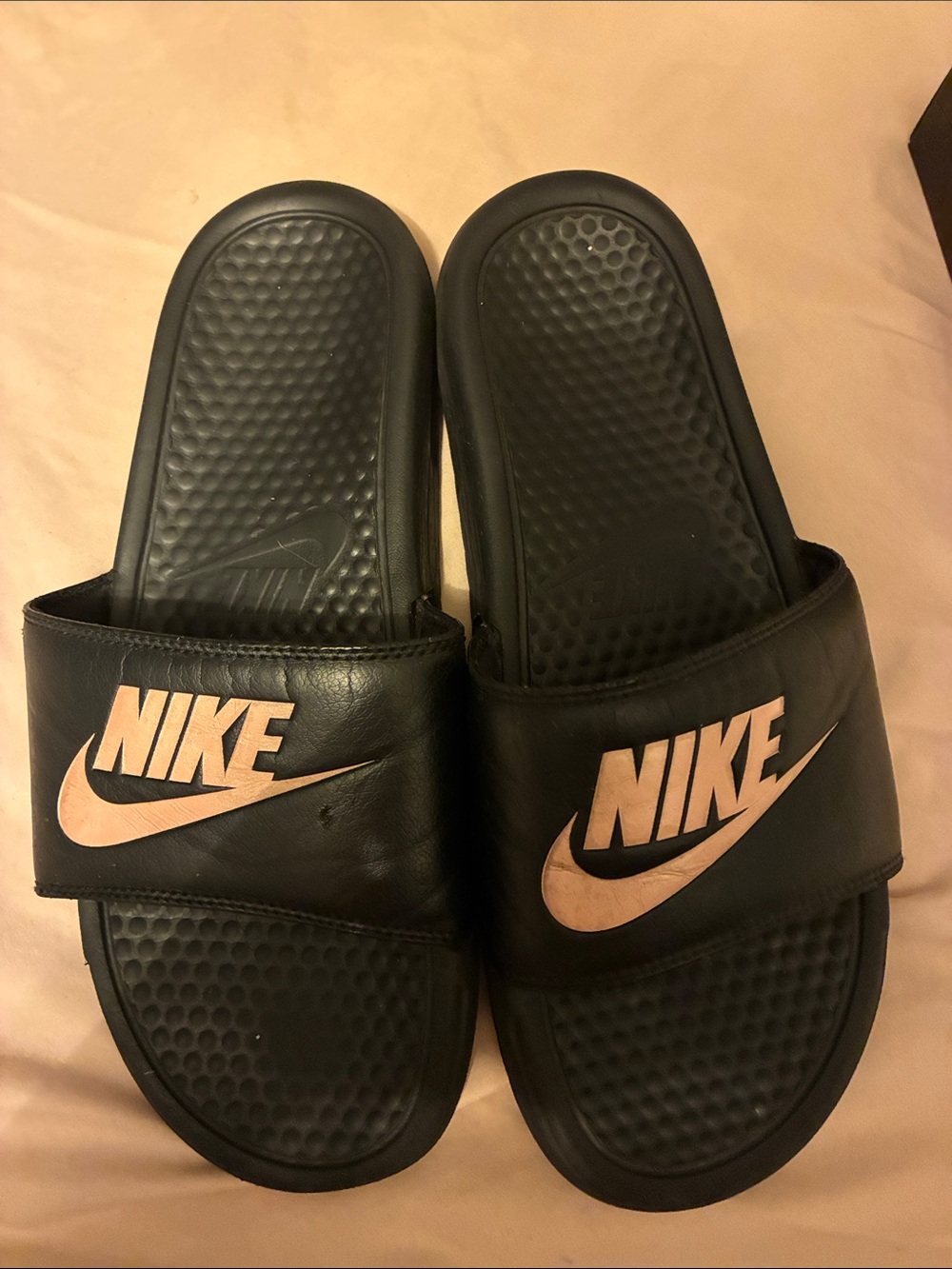 Nike Black Slides with Rose Gold Logo